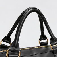 Sac de voyage noir et or à roulettes imperméable RAVELEE